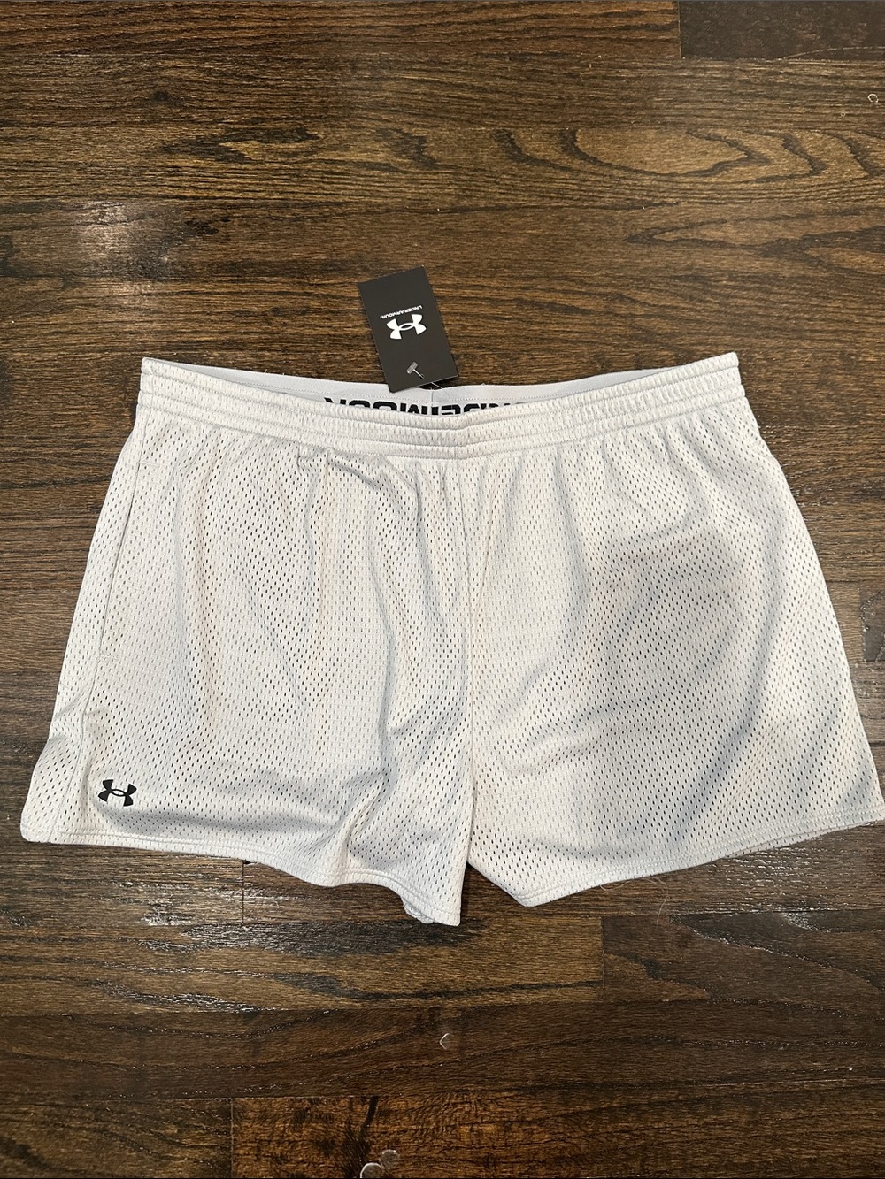 NWT- Under Armour silver women’s Mesh Training Shorts. Size L